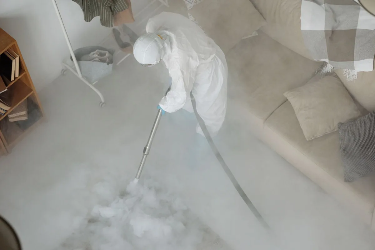 Biohazard cleanup technician in protective equipment, Hyde, PA